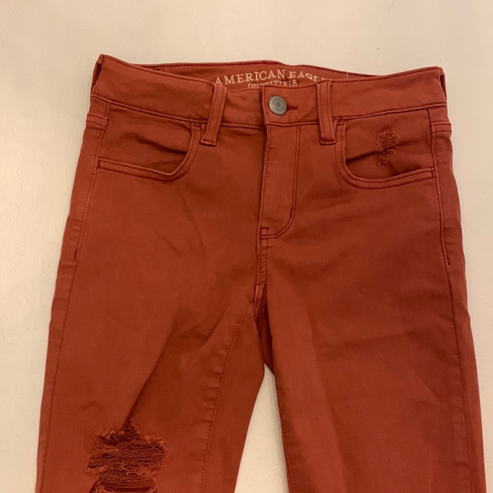 Red Ripped Jeans American Eagle